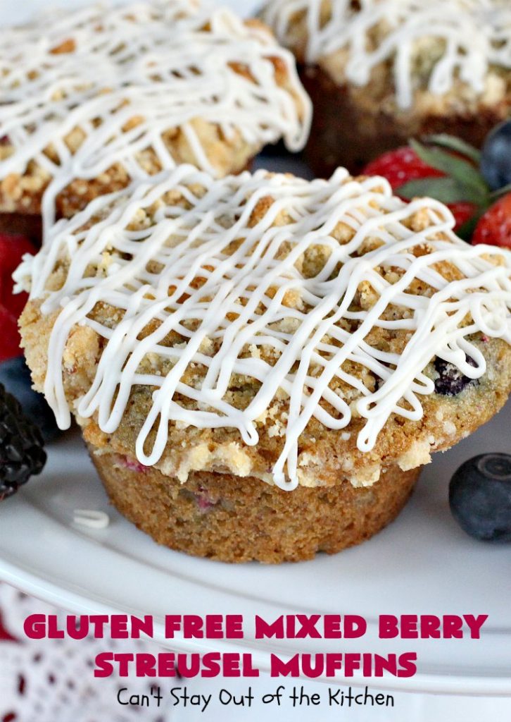 Gluten Free Mixed Berry Streusel Muffins | Can't Stay Out of the Kitchen | these fantastic #muffins are filled with #blueberries, #raspberries, #blackberries & #strawberries. They're topped with a delicious #walnut streusel & iced with a vanilla glaze. They make up one mouthwatering #muffin for a weekend, company or #holiday #breakfast. #GlutenFree #GlutenFreeMuffins #GlutenFreeMixedBerryStreuselMuffins
