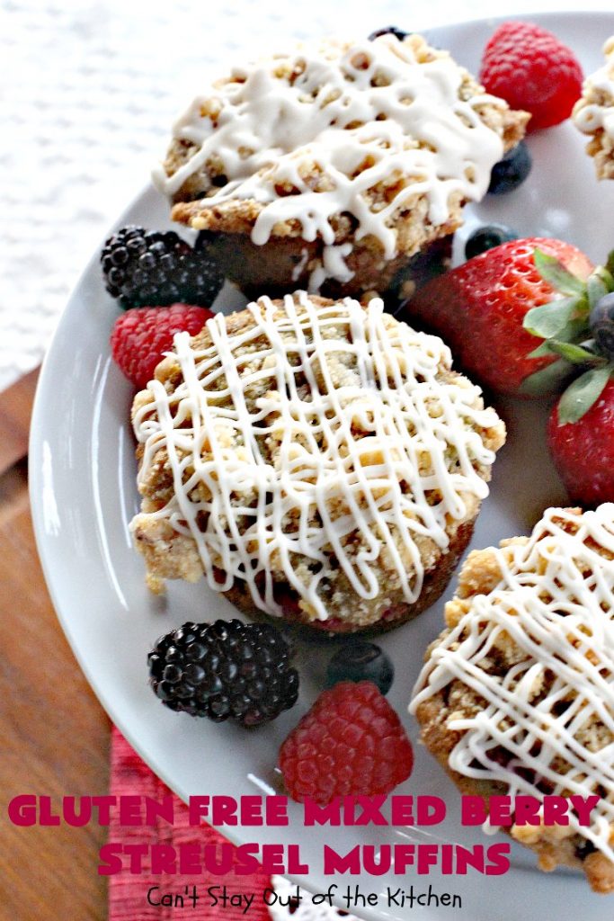 Gluten Free Mixed Berry Streusel Muffins | Can't Stay Out of the Kitchen | these fantastic #muffins are filled with #blueberries, #raspberries, #blackberries & #strawberries. They're topped with a delicious #walnut streusel & iced with a vanilla glaze. They make up one mouthwatering #muffin for a weekend, company or #holiday #breakfast. #GlutenFree #GlutenFreeMuffins #GlutenFreeMixedBerryStreuselMuffins
