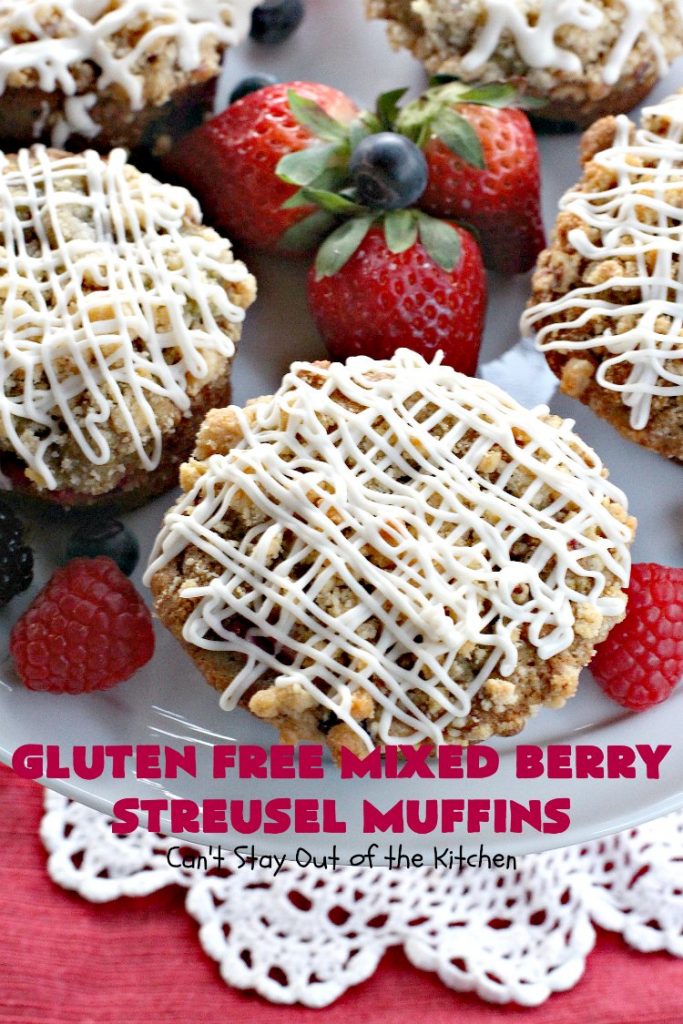Gluten Free Mixed Berry Streusel Muffins | Can't Stay Out of the Kitchen | these fantastic #muffins are filled with #blueberries, #raspberries, #blackberries & #strawberries. They're topped with a delicious #walnut streusel & iced with a vanilla glaze. They make up one mouthwatering #muffin for a weekend, company or #holiday #breakfast. #GlutenFree #GlutenFreeMuffins #GlutenFreeMixedBerryStreuselMuffins
