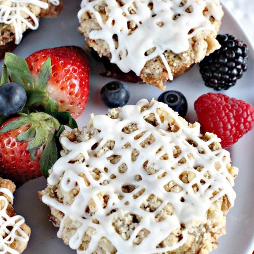 Gluten Free Mixed Berry Streusel Muffins | Can't Stay Out of the Kitchen | these fantastic #muffins are filled with #blueberries, #raspberries, #blackberries & #strawberries. They're topped with a delicious #walnut streusel & iced with a vanilla glaze. They make up one mouthwatering #muffin for a weekend, company or #holiday #breakfast. #GlutenFree #GlutenFreeMuffins #GlutenFreeMixedBerryStreuselMuffins