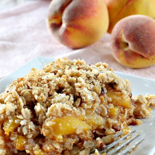 Gluten Free Peach Surprise | Can't Stay Out of the Kitchen | this fantastic #peach #dessert is absolutely spectacular. It uses gluten free flour & coconut oil so it's #glutenfree & #vegan. It's a terrific #recipe for summer #holidays, backyard barbecues & potlucks. Our company loved it! #hazelnuts