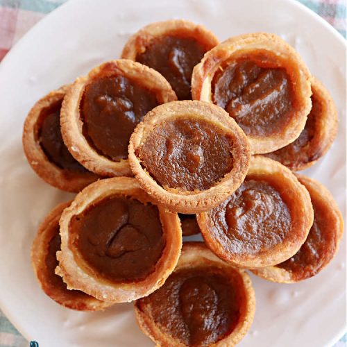 Gluten Free Pumpkin Tarts | Can't Stay Out of the Kitchen | these miniature #PumpkinPie tarts are a great treat for #FallBaking, #holiday parties or #Thanksgiving or #Christmas dinner. Every bite is like eating a tiny #pumpkin #pie. Plus, you can use #GlutenFree or regular flour. Both ways are fantastic. Great for #tailgating too. #dessert #GlutenFreePumpkinTarts #PumpkinDessert