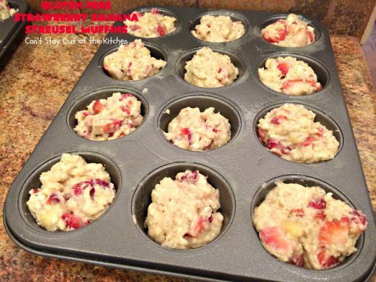 Gluten Free Strawberry Banana Streusel Muffins | Can't Stay Out of the Kitchen | these spectacular #muffins are so mouthwatering & delicious. Terrific for a #holiday #breakfast like #Christmas or #NewYearsDay. They include #strawberries, #Bananas & #GreekYogurt. They have a #streusel topping & then icing on top which makes them perfect! #GlutenFree #HolidayBreakfast #GlutenFreeStrawberryBananaStreuselMuffins