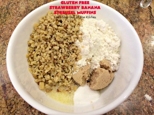 Gluten Free Strawberry Banana Streusel Muffins | Can't Stay Out of the Kitchen | these spectacular #muffins are so mouthwatering & delicious. Terrific for a #holiday #breakfast like #Christmas or #NewYearsDay. They include #strawberries, #Bananas & #GreekYogurt. They have a #streusel topping & then icing on top which makes them perfect! #GlutenFree #HolidayBreakfast #GlutenFreeStrawberryBananaStreuselMuffins