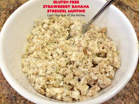 Gluten Free Strawberry Banana Streusel Muffins | Can't Stay Out of the Kitchen | these spectacular #muffins are so mouthwatering & delicious. Terrific for a #holiday #breakfast like #Christmas or #NewYearsDay. They include #strawberries, #Bananas & #GreekYogurt. They have a #streusel topping & then icing on top which makes them perfect! #GlutenFree #HolidayBreakfast #GlutenFreeStrawberryBananaStreuselMuffins