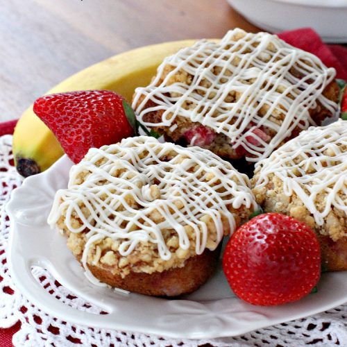 Gluten Free Strawberry Banana Streusel Muffins | Can't Stay Out of the Kitchen | these spectacular #muffins are so mouthwatering & delicious. Terrific for a #holiday #breakfast like #Christmas or #NewYearsDay. They include #strawberries, #Bananas & #GreekYogurt. They have a #streusel topping & then icing on top which makes them perfect! #GlutenFree #HolidayBreakfast #GlutenFreeStrawberryBananaStreuselMuffins