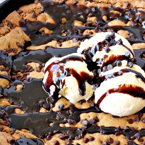 Gluten Free Toll House Skillet Cookie | Can't Stay Out of the Kitchen | this spectacular #skillet #cookie is everything you can ask for in a #dessert. It's rich, chocolaty, decadent & takes #TollHouse #cookies to the next level. Great for a #holiday #dessert like #FathersDay. This one's made with #glutenfree flour & #coconutsugar. #chocolate #chocolatechipcookies