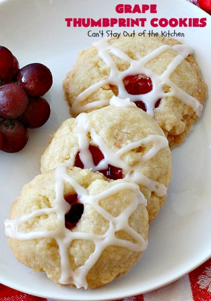 Grape Thumbprint Cookies | Can't Stay Out of the Kitchen | these amazing #cookies are filled with #grape jam & glazed with a powdered sugar icing. They're wonderful for any kind of #holiday or special occasion #baking. #dessert