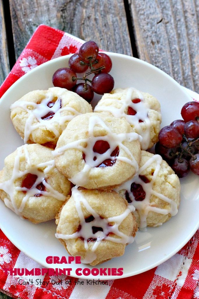 Grape Thumbprint Cookies | Can't Stay Out of the Kitchen | these amazing #cookies are filled with #grape jam & glazed with a powdered sugar icing. They're wonderful for any kind of #holiday or special occasion #baking. #dessert