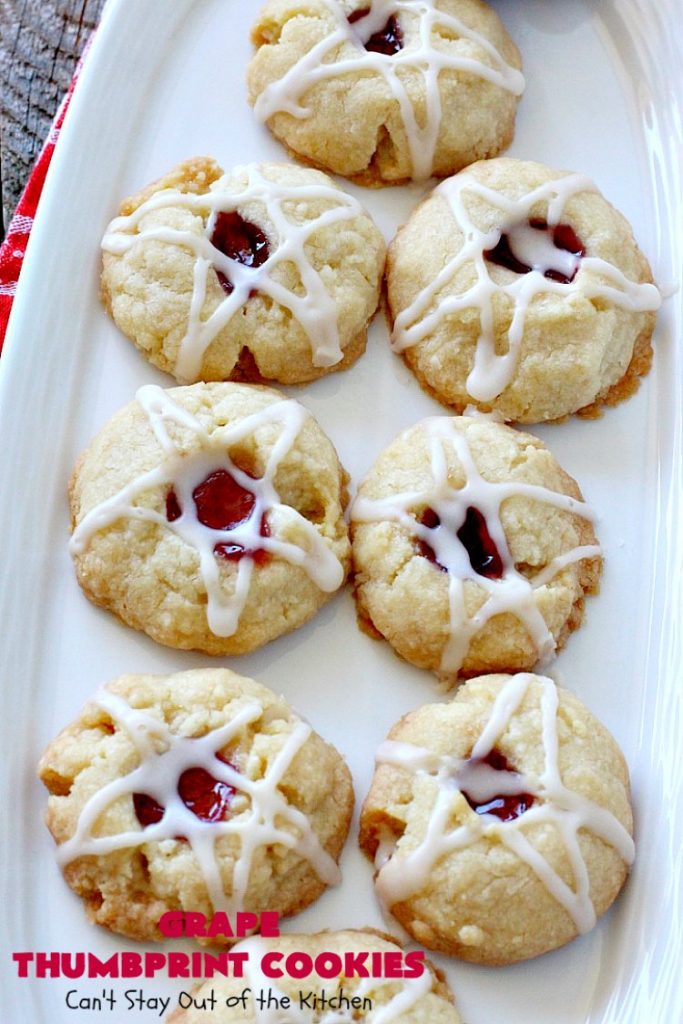 Grape Thumbprint Cookies | Can't Stay Out of the Kitchen | these amazing #cookies are filled with #grape jam & glazed with a powdered sugar icing. They're wonderful for any kind of #holiday or special occasion #baking. #dessert