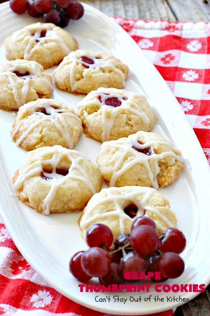 Grape Thumbprint Cookies | Can't Stay Out of the Kitchen | these amazing #cookies are filled with #grape jam & glazed with a powdered sugar icing. They're wonderful for any kind of #holiday or special occasion #baking. #dessert