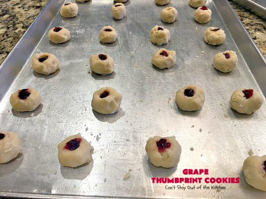 Grape Thumbprint Cookies | Can't Stay Out of the Kitchen | these amazing #cookies are filled with #grape jam & glazed with a powdered sugar icing. They're wonderful for any kind of #holiday or special occasion #baking. #dessert