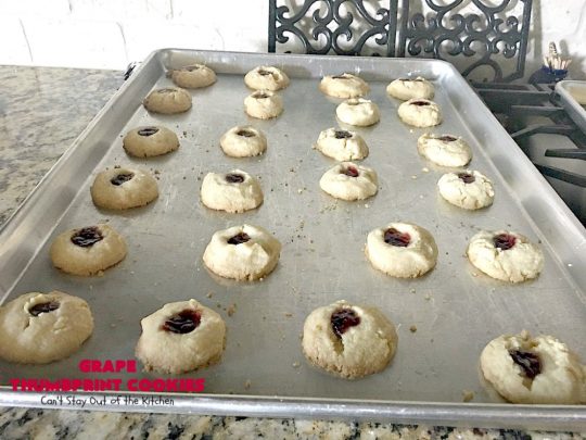 Grape Thumbprint Cookies | Can't Stay Out of the Kitchen | these amazing #cookies are filled with #grape jam & glazed with a powdered sugar icing. They're wonderful for any kind of #holiday or special occasion #baking. #dessert
