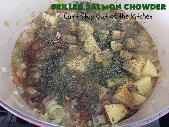Grilled Salmon Chowder | Can't Stay Out of the Kitchen | this is one of the best #seafood #chowder #recipes ever! It includes chunks of #GrilledSalmon, #potatoes, #carrots, #corn, #peas & #leeks. #OldBaySeasoning gives it great flavor. It's thick, hearty, satisfying and comforting for any weeknight meal. #bacon #pork #salmon #fish #chives #GrilledSalmonChowder
