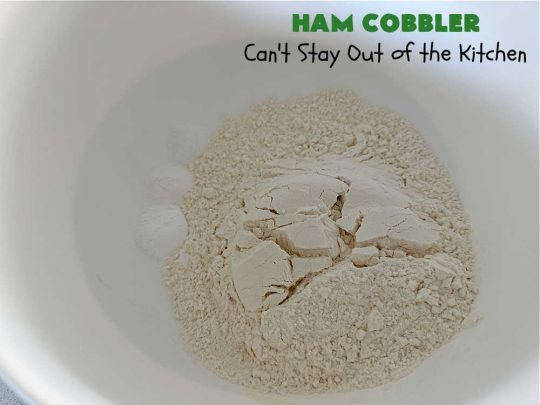 Ham Cobbler | Can't Stay Out of the Kitchen | this delicious #casserole includes #ham & #vegetables in a thick sauce & it's topped with #CheddarBayBiscuits. It's a real comfort food experience that your family is sure to enjoy. Great for #potlucks & an excellent way to use up leftover #holiday ham. #HamCobbler