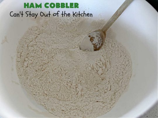 Ham Cobbler | Can't Stay Out of the Kitchen | this delicious #casserole includes #ham & #vegetables in a thick sauce & it's topped with #CheddarBayBiscuits. It's a real comfort food experience that your family is sure to enjoy. Great for #potlucks & an excellent way to use up leftover #holiday ham. #HamCobbler