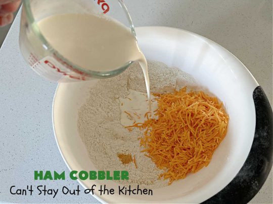 Ham Cobbler | Can't Stay Out of the Kitchen | this delicious #casserole includes #ham & #vegetables in a thick sauce & it's topped with #CheddarBayBiscuits. It's a real comfort food experience that your family is sure to enjoy. Great for #potlucks & an excellent way to use up leftover #holiday ham. #HamCobbler