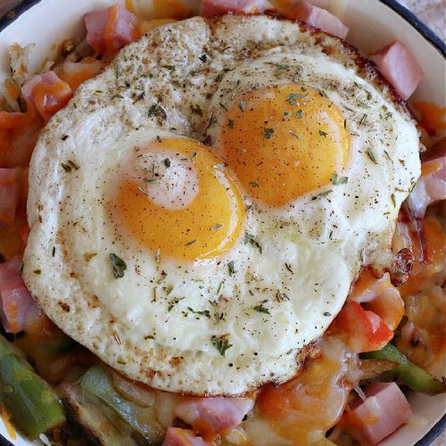 Ham and Bell Pepper Breakfast Skillet | Can't Stay Out of the Kitchen | this hearty & delicious #BreakfastSkillet includes #ham & four kinds of #BellPeppers along with #HashBrowns, #eggs & both #MontereyJack & #CheddarCheese. It makes a totally satisfying & filling weekend or company #breakfast. #holiday #HolidayBreakfast #SkilletBreakfast #HamAndBellPepperBreakfastSkillet #GlutenFree #pork