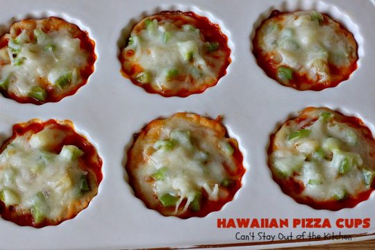 Hawaiian Pizza Cups | Can't Stay Out of the Kitchen | these fantastic miniature #pizzas are the best #appetizer of choice for #tailgating parties or the #SuperBowl! They're filled with spaghetti sauce, #ham, #pineapple & green bell pepper. Every bite is so mouthwatering, you'll be fighting others for the last one! #MozzarellaCheese #PillsburyRefrigeratedBiscuits #MiniaturePizzas #HawaiianPizzaCups