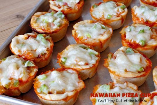 Hawaiian Pizza Cups | Can't Stay Out of the Kitchen | these fantastic miniature #pizzas are the best #appetizer of choice for #tailgating parties or the #SuperBowl! They're filled with spaghetti sauce, #ham, #pineapple & green bell pepper. Every bite is so mouthwatering, you'll be fighting others for the last one! #MozzarellaCheese #PillsburyRefrigeratedBiscuits #MiniaturePizzas #HawaiianPizzaCups