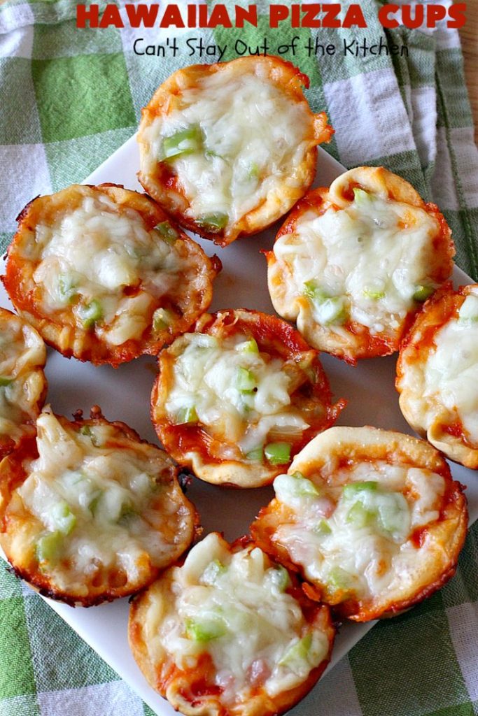 Hawaiian Pizza Cups | Can't Stay Out of the Kitchen | these fantastic miniature #pizzas are the best #appetizer of choice for #tailgating parties or the #SuperBowl! They're filled with spaghetti sauce, #ham, #pineapple & green bell pepper. Every bite is so mouthwatering, you'll be fighting others for the last one! #MozzarellaCheese #PillsburyRefrigeratedBiscuits #MiniaturePizzas #HawaiianPizzaCups