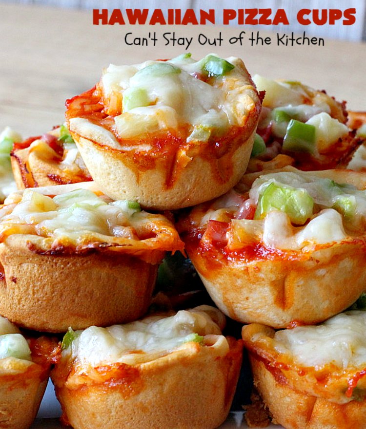 Hawaiian Pizza Cups | Can't Stay Out of the Kitchen | these fantastic miniature #pizzas are the best #appetizer of choice for #tailgating parties or the #SuperBowl! They're filled with spaghetti sauce, #ham, #pineapple & green bell pepper. Every bite is so mouthwatering, you'll be fighting others for the last one! #MozzarellaCheese #PillsburyRefrigeratedBiscuits #MiniaturePizzas #HawaiianPizzaCups