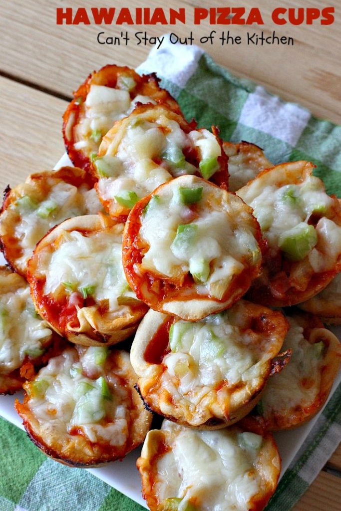 Hawaiian Pizza Cups | Can't Stay Out of the Kitchen | these fantastic miniature #pizzas are the best #appetizer of choice for #tailgating parties or the #SuperBowl! They're filled with spaghetti sauce, #ham, #pineapple & green bell pepper. Every bite is so mouthwatering, you'll be fighting others for the last one! #MozzarellaCheese #PillsburyRefrigeratedBiscuits #MiniaturePizzas #HawaiianPizzaCups