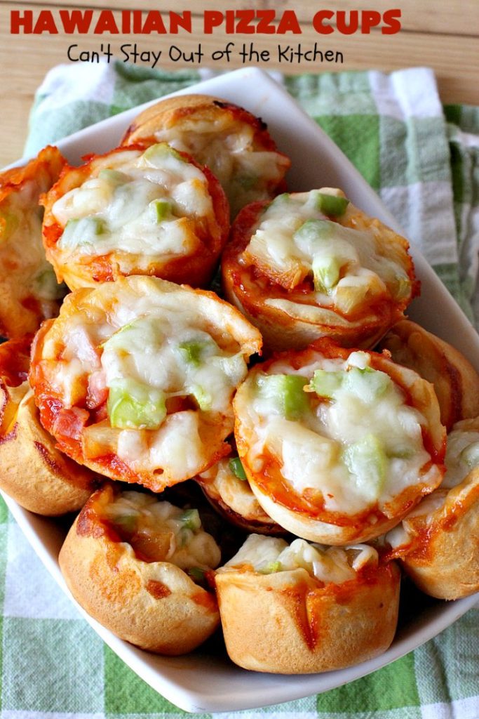 Hawaiian Pizza Cups | Can't Stay Out of the Kitchen | these fantastic miniature #pizzas are the best #appetizer of choice for #tailgating parties or the #SuperBowl! They're filled with spaghetti sauce, #ham, #pineapple & green bell pepper. Every bite is so mouthwatering, you'll be fighting others for the last one! #MozzarellaCheese #PillsburyRefrigeratedBiscuits #MiniaturePizzas #HawaiianPizzaCups