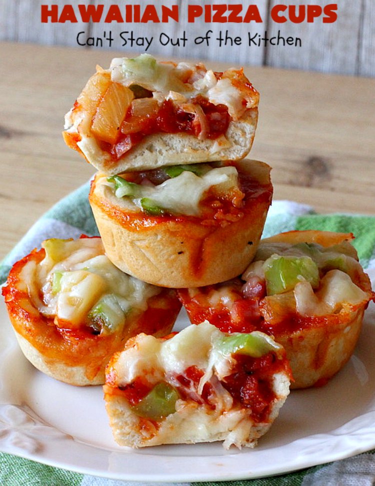 Hawaiian Pizza Cups | Can't Stay Out of the Kitchen | these fantastic miniature #pizzas are the best #appetizer of choice for #tailgating parties or the #SuperBowl! They're filled with spaghetti sauce, #ham, #pineapple & green bell pepper. Every bite is so mouthwatering, you'll be fighting others for the last one! #MozzarellaCheese #PillsburyRefrigeratedBiscuits #MiniaturePizzas #HawaiianPizzaCups