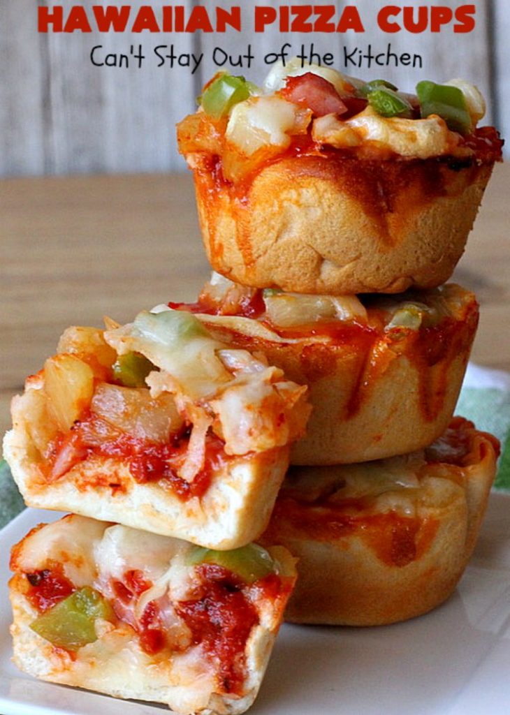 Hawaiian Pizza Cups | Can't Stay Out of the Kitchen | these fantastic miniature #pizzas are the best #appetizer of choice for #tailgating parties or the #SuperBowl! They're filled with spaghetti sauce, #ham, #pineapple & green bell pepper. Every bite is so mouthwatering, you'll be fighting others for the last one! #MozzarellaCheese #PillsburyRefrigeratedBiscuits #MiniaturePizzas #HawaiianPizzaCups