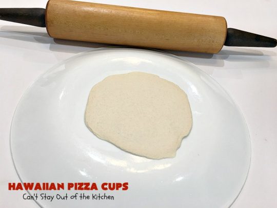Hawaiian Pizza Cups | Can't Stay Out of the Kitchen | these fantastic miniature #pizzas are the best #appetizer of choice for #tailgating parties or the #SuperBowl! They're filled with spaghetti sauce, #ham, #pineapple & green bell pepper. Every bite is so mouthwatering, you'll be fighting others for the last one! #MozzarellaCheese #PillsburyRefrigeratedBiscuits #MiniaturePizzas #HawaiianPizzaCups