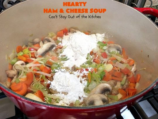 Hearty Ham and Cheese Soup | Can't Stay Out of the Kitchen | this fantastic #soup started out with leftover #ham from the #holidays! It's chocked full of #veggies & seasoned to perfection. Terrific for cold, dreary winter nights when you want to warm up! #peas #corn #greenbeans #carrots #redpotatoes #mushrooms #cheddarcheese #HamSoup #pork #HamandCheeseSoup