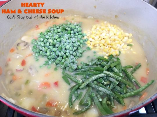 Hearty Ham and Cheese Soup | Can't Stay Out of the Kitchen | this fantastic #soup started out with leftover #ham from the #holidays! It's chocked full of #veggies & seasoned to perfection. Terrific for cold, dreary winter nights when you want to warm up! #peas #corn #greenbeans #carrots #redpotatoes #mushrooms #cheddarcheese #HamSoup #pork #HamandCheeseSoup