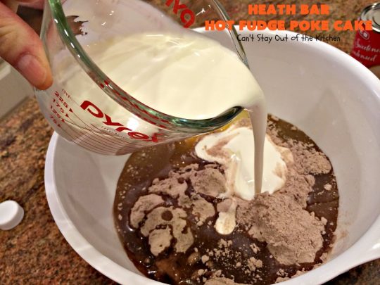 Heath Bar Hot Fudge Poke Cake | Can't Stay Out of the Kitchen | this fantastic #pokecake starts with a #chocolate #cake mix. After baking, it's spread with condensed milk & #hotfudge sauce. Then it's topped with loads of #HeathToffee bars! It is so incredibly amazing & perfect for company or any #holiday party. #dessert