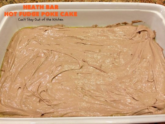Heath Bar Hot Fudge Poke Cake | Can't Stay Out of the Kitchen | this fantastic #pokecake starts with a #chocolate #cake mix. After baking, it's spread with condensed milk & #hotfudge sauce. Then it's topped with loads of #HeathToffee bars! It is so incredibly amazing & perfect for company or any #holiday party. #dessert
