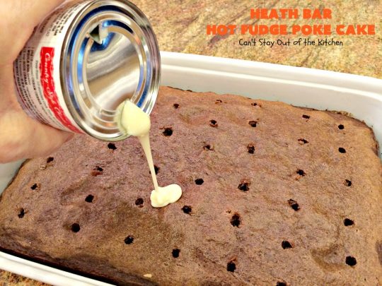Heath Bar Hot Fudge Poke Cake | Can't Stay Out of the Kitchen | this fantastic #pokecake starts with a #chocolate #cake mix. After baking, it's spread with condensed milk & #hotfudge sauce. Then it's topped with loads of #HeathToffee bars! It is so incredibly amazing & perfect for company or any #holiday party. #dessert