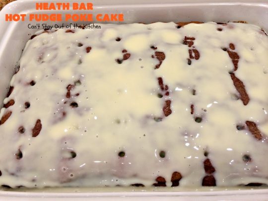 Heath Bar Hot Fudge Poke Cake | Can't Stay Out of the Kitchen | this fantastic #pokecake starts with a #chocolate #cake mix. After baking, it's spread with condensed milk & #hotfudge sauce. Then it's topped with loads of #HeathToffee bars! It is so incredibly amazing & perfect for company or any #holiday party. #dessert