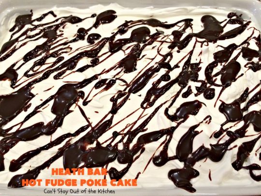 Heath Bar Hot Fudge Poke Cake | Can't Stay Out of the Kitchen | this fantastic #pokecake starts with a #chocolate #cake mix. After baking, it's spread with condensed milk & #hotfudge sauce. Then it's topped with loads of #HeathToffee bars! It is so incredibly amazing & perfect for company or any #holiday party. #dessert