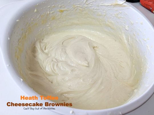 Heath Toffee Cheesecake Brownies | Can't Stay Out of the Kitchen | these #brownies are divine! #HeathEnglishToffeeBits are added to #cookie dough and sandwiched between a luscious #cheesecake layer. This #dessert is amazing.