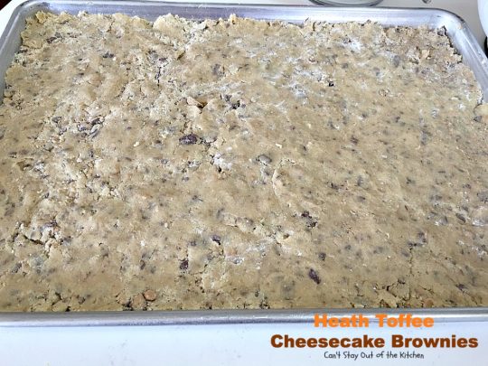 Heath Toffee Cheesecake Brownies | Can't Stay Out of the Kitchen | these #brownies are divine! #HeathEnglishToffeeBits are added to #cookie dough and sandwiched between a luscious #cheesecake layer. This #dessert is amazing.