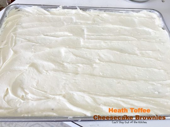 Heath Toffee Cheesecake Brownies | Can't Stay Out of the Kitchen | these #brownies are divine! #HeathEnglishToffeeBits are added to #cookie dough and sandwiched between a luscious #cheesecake layer. This #dessert is amazing.