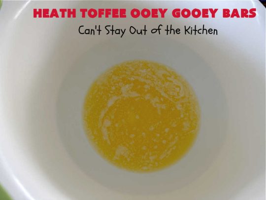 Heath Toffee Ooey Gooey Bars | Can't Stay Out of the Kitchen | These #OoeyGooeyBars are outrageously good! If you want an earth-shattering experience, bake up a batch of these lovely #brownies for your next #tailgating party, potluck or backyard BBQ. This easy #recipe uses only 6 ingredients! #cookies #dessert #HeathEnglishToffeeBits #HeathToffee #HeathToffeeOoeyGooeyBars