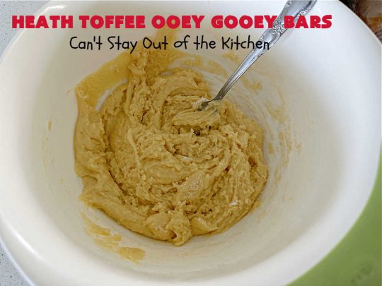 Heath Toffee Ooey Gooey Bars | Can't Stay Out of the Kitchen | These #OoeyGooeyBars are outrageously good! If you want an earth-shattering experience, bake up a batch of these lovely #brownies for your next #tailgating party, potluck or backyard BBQ. This easy #recipe uses only 6 ingredients! #cookies #dessert #HeathEnglishToffeeBits #HeathToffee #HeathToffeeOoeyGooeyBars