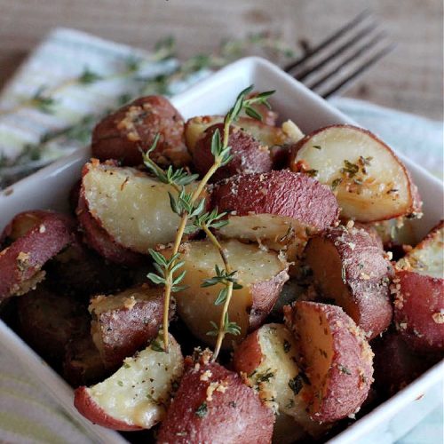 Herb Roasted Parmesan Potatoes | Can't Stay Out of the Kitchen | these #RoastedPotatoes are savory & delicious. They're easy to throw together and wonderful to serve for family, company or #holiday dinners. #ParmesanCheese #potatoes #GlutenFree #SideDish #HerbRoastedParmesanPotatoes
