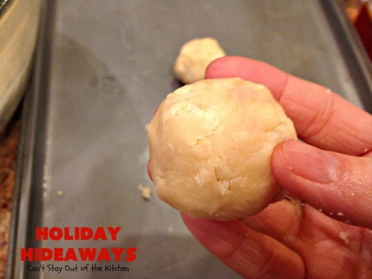 Holiday Hideaways | Can't Stay Out of the Kitchen | these scrumptious #cookies have a #maraschinocherry hidden inside each one! Then they're dunked in #chocolate or #vanilla bark before sprinkling with additional bark shavings. So festive & beautiful for #holiday or #Christmas #baking. #Christmas #ChristmasDessert #ChristmasCookieExchange #cherries #ChocolateDessert #CherryDessert #dessert