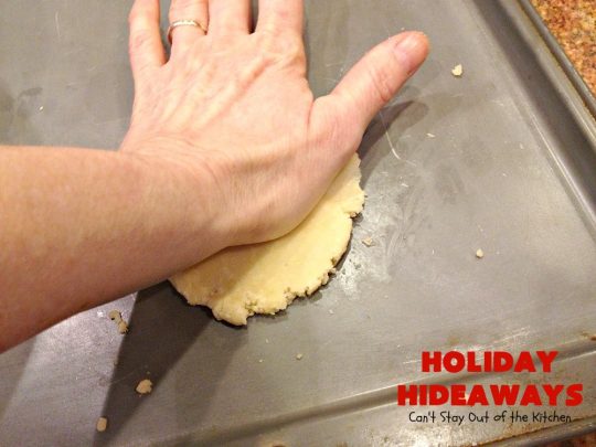 Holiday Hideaways | Can't Stay Out of the Kitchen | these scrumptious #cookies have a #maraschinocherry hidden inside each one! Then they're dunked in #chocolate or #vanilla bark before sprinkling with additional bark shavings. So festive & beautiful for #holiday or #Christmas #baking. #Christmas #ChristmasDessert #ChristmasCookieExchange #cherries #ChocolateDessert #CherryDessert #dessert