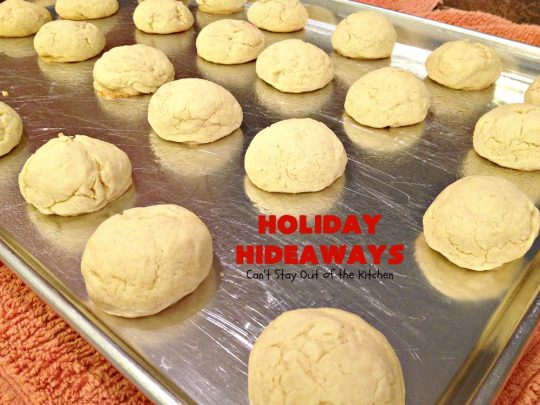 Holiday Hideaways | Can't Stay Out of the Kitchen | these scrumptious #cookies have a #maraschinocherry hidden inside each one! Then they're dunked in #chocolate or #vanilla bark before sprinkling with additional bark shavings. So festive & beautiful for #holiday or #Christmas #baking. #Christmas #ChristmasDessert #ChristmasCookieExchange #cherries #ChocolateDessert #CherryDessert #dessert