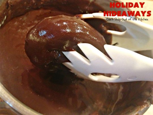 Holiday Hideaways | Can't Stay Out of the Kitchen | these scrumptious #cookies have a #maraschinocherry hidden inside each one! Then they're dunked in #chocolate or #vanilla bark before sprinkling with additional bark shavings. So festive & beautiful for #holiday or #Christmas #baking. #Christmas #ChristmasDessert #ChristmasCookieExchange #cherries #ChocolateDessert #CherryDessert #dessert