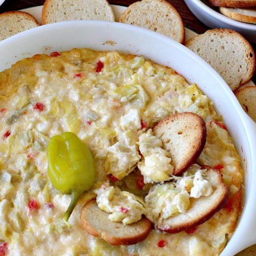 Hot Feta Artichoke Dip | Can't Stay Out of the Kitchen | This fantastic #appetizer is so easy to make & uses only 6 ingredients. It's perfect for #holiday or #tailgating parties. #FetaCheese #artichokes #ParmesanCheese #GlutenFree #GlutenFreeAppetizer #HolidayAppetizer #HotFetaArtichokeDip