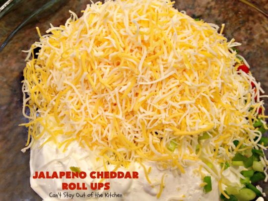 Jalapeno Cheddar Roll Ups | Can't Stay Out of the Kitchen | these fantastic #TexMex #appetizers are terrific for #tailgating, #NewYearsEve or #SuperBowl parties. Filled with #refriedbeans, #chilies, #olives, & lots of #cheese.